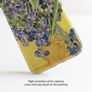 Vase With Irises Against A Yellow Background
