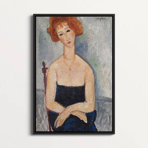 Red Headed Woman Wearing a Pendant
