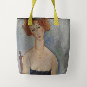 Red Headed Woman Wearing a Pendant